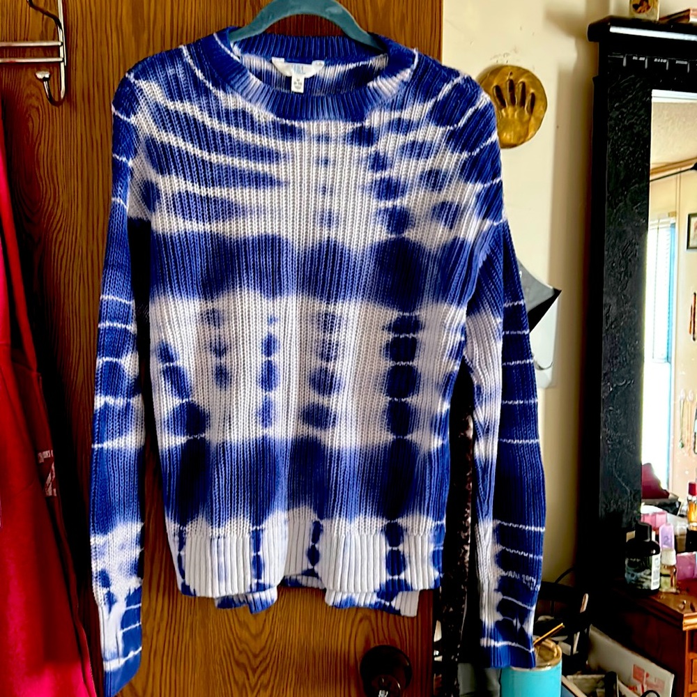 Blue and white knit sweater.
